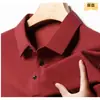 Nueva camiseta de manga larga para hombre con tejido gofrado, camisa polo casual de negocios de primavera con cuello desplegable, top base elástico