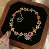 Pulsera Flor de Zirconia Chapada en Oro Real de 18k Lujo Ligero Moda de Gama Alta Exquisito Anillo de Mano Nicho Versátil Joyería de Mano para Mujeres