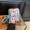 A Bolsa Quadrada Pequena Estampada Retro da Moda Francesa Deste Ano Tem um Toque Refinado e é uma Mini Bolsa de Ombro Transversal