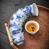 Taza de té vintage azul y blanco, taza invertida, cerámica Dehua, diseño de paisaje, uso doméstico, juego de té kung fu, taza para invitados, venta al por mayor de fabricante
