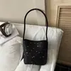 Bolsa de ombro casual de grande capacidade, novo estilo verão 2026, bolsa tote fofa estilo coreano nicho com estampa de estrela para mulheres
