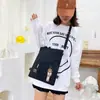 2025 Nuevo Estilo Coreano Bolso de Lona de Color Puro Simple Mochila Ligera Moda para Estudiante de Primaria Bolso Tote Escolar de Moda
