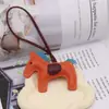En Stock Mayoreo Cuero PU Borla Poni Llavero Colgante para Bolso Decoración Llavero Moda Pequeño Regalo Fábrica