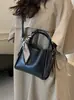 Cross2026 Otoño Invierno Nuevo Bolso de Mano Retro Bolso de Hombro Único para Mujer Bolso Cruzado Tipo Cubo Versátil para Salidas de Moda