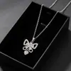 Colar Cruz 2026 Completo de Diamante Versão Alta Pingente Elegante de Laço Corrente Versátil para Clavícula Colar Borboleta Feminino Acessórios Atacado