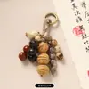Colgante de Bolso de Concha de Planta Natural Sonajero Hecho a Mano Terapia de Sonido Campana Colgante Decoración de Mochila Carillón de Viento de Sanación del Bosque Adorno Colgante para Coche