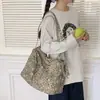 Bolsa de nylon com estampa de leopardo retrô de nicho para mulheres, novo modelo 2026, grande capacidade, moderna e versátil, adequada para o trabalho, pode ser usada como bolsa de ombro ou transversal.