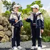 Uniforme escolar para estudiantes de primaria y secundaria en otoño e invierno con forro de terciopelo conjunto de tres piezas ropa deportiva infantil ropa de clase jardín de infantes Ropa de jardín