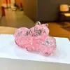 Atacado de bolinhas com líquido e glitter, garrafinhas de areia movediça que brilham no escuro e enfeites de mesa criativos com tema de motocicleta; pingentes e acessórios de acrílico