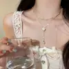 Collar de Perlas con Borlas de Doble Capa para Mujer, Diseño Nicho, Cadena Clavicular de Camelia, Lujo Accesible, Cadena de Cuello Elegante de Alta Gama