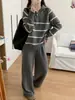Nuevo Conjunto Casual de Punto Primavera 2026 Suéter Rayado Bloques de Color Media Cremallera Pantalones Anchos Holgados Conjunto de Dos Piezas para Mujer