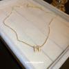 Collar con colgante de letra de circón con concha galvanizada en oro real para mujer, cadena de clavícula de lujo ligera de alta calidad de Corea del Sur, venta al por mayor para mujer