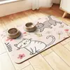 Tapete para alimentar mascotas para gatos y perros, tapete absorbente de secado rápido, tapete antideslizante resistente a la suciedad, lindo tapete de piso de tierra de diatomeas con caricaturas