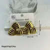 Pendientes geométricos de acero inoxidable a rayas estilo ins transfronterizos europeos y americanos, modernos y versátiles, venta al por mayor de fabricantes de pendientes transfronterizos