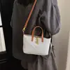 Bolso de Mano Tejido Transfronterizo para Mujer 2026 Nuevo Estilo Bolso de Bollo Hueco Verano Versátil Bolso de Hombro Cruzado para Viajes