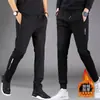 Calça masculina de fleece para outono e inverno, com elasticidade em quatro direções, zíper, múltiplos bolsos, cintura elástica, corte reto solto, estilo jogger
