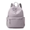 Mochila Versátil de Tela de Nylon para Viajes de Moda al Aire Libre Transfronteriza Ligera Nuevo Estilo Gran Capacidad Mochila Pequeña de Moda Bolso de Doble Hombro