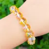 Venta al por mayor Yiwu artículos pequeños bola de flor cuentas pulsera de cristal femenina diy pulsera de cuentas para pareja estudiante pulsera arcoíris