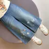 Pantalones Anchos de Dibujos Animados de Estrella de Otoño Transfronterizos Nuevos para Niños 2026 Versión Coreana Pantalones Vaqueros Escolares para Niñas Ropa Infantil de Moda