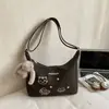 Bolsa de Dumpling Estampada Casual de Grande Capacidade para Mulheres 2025 Nova Tendência Bolsa de Ombro para Estudantes Bolsa Transversal Versátil Estilosa