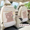 El protector de respaldo de asiento de coche Blue Rain, con un lindo diseño de oso de dibujos animados, es un organizador para el asiento trasero del coche que protege contra la suciedad y las patadas