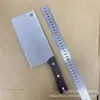 Los cuchillos Yangjiang son populares con mangos de veta de madera, hojas arenadas, cuchillos para rebanar, cuchillos de cocina afilados para el hogar y cuchillos de cocina de estilo chino