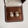 Pendientes de Botón de Perla con Lazo de Alta Gama Franceses para Mujer Retro Lujo Ligero Moda Tendencia Versátiles Joyería para Oreja