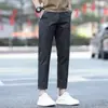 Pantalones casuales de otoño para hombre, estilo nuevo de outlet, versátiles, ajustados, de pierna recta, cónicos, negros para hombre