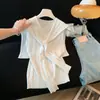 Suéter de Tricô Vazado com Decote em V Estilo Doce para Mulheres, Conjunto de Duas Peças Pulôver Fino Shawl para o Verão 2026, Top Respirável Amigo da Pele