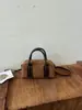 Bolso de mano retro estilo Boston con forma de concha para mujer, nueva colección 2025, moda transfronteriza de tendencia, bolso de hombro de gamuza
