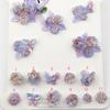 Nueva bolsa de material de flor brocada púrpura accesorios para uñas luciérnaga luminosa mariposa accesorios para uñas mixtos al por mayor