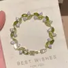 Pulseira Colorida de Pedra Preciosa Flor de Trevo de Quatro Folhas Transfronteiriça Europeia e Americana, Fashionável e Versátil, Luxo Leve com um Toque de Alto Padrão, Pulseira de Cobre Cravejada com Zircônia de Diamante Completo