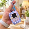 Colgante de Máquina Electrónica de Mascotas Transfronteriza, Consola de Juegos Portátil para Niños, Juguete Interactivo de Desarrollo, Colgante para Llavero