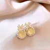 Pendientes de Gato de Ojo de Tigre Geométrico Coreano de Aguja Plateada Pendientes Dulces de Zirconita con Lazo Lujo Accesible Pendientes Versátiles de Gama Alta para Mujer