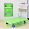 Carro plano de plástico de cuatro ruedas y cinco ruedas tubo cuadrado engrosado buen material carga pesada silencioso se adapta a múltiples superficies de carretera plegable