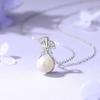 Collar de perlas Jin Hongyu con forma de bolsa de la fortuna de albaricoque pequeño para mujer, estilo francés, estilo Chanel, cadena de clavícula de alta gama, colgante de lujo ligero y moderno.