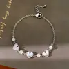 Pulsera de corazón con cuentas de circonita chapada en oro real de 18 quilates para mujer, pulsera de nicho de lujo ligero de alta gama, joyería exquisita y versátil