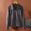 Ropa de mujer estilo europeo y americano transfronteriza, nueva colección otoño 2026, chaqueta de piel de oveja con cuello solapa, top talla grande