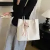Bolsa Grande de Textura Retrô Feminina 2026 Nova Outono Casual Bolsa de Ombro Bolsa Tote para Estudante Aula Trabalho