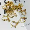 Aretes de Estilo Exótico de Venta Caliente Retro Literario Clásico Dignificado Ganchos para la Oreja Versátil Hueco Moda Borla Colgantes
