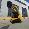 Exportado a los Estados Unidos: Cargadora compacta de orugas Ht75, Cargadora compacta pequeña montada en cabina para carga y descarga, Máquina compacta multifuncional micro