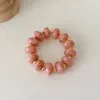 Pulsera elástica de cuentas planas estilo vintage europeo y americano para mujer, pulsera de resina superventas transfronteriza, joyas y accesorios para la mano