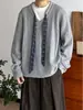 Suéter de punto grueso con diseño de retazos a cuadros estilo universitario japonés para hombres y mujeres, otoño e invierno, con caída relajada y mangas largas