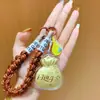 Llavero Colgante Cadena Bolsa de la Suerte de Perlas de Agua Dorada, Símbolo de Fortuna Mismo Estilo Tienda Dorada, Amuleto de Bolsa Atrae Riqueza, Artículo Popular de Xiaohongshu