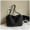 Bolsa Feminina da Moda Nova Primavera Vintage Estilosa de Ombro de Nicho Bolsa de Ombro Casual Simples Bolsa Tote Grande