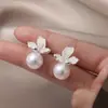 Aretes de Flor de Iris Aguja de Plata Perla Cristal Elegantes de Lujo Ligero Nuevos Únicos Suministro Transfronterizo Aretes al por Mayor