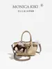Bolso de Mano Pequeño de Primavera para Mujer 2026 Modelo Nuevo Textura de Alta Gama Nicho Bolso Cruzado de Lujo Ligero para Salir al Trabajo Bolso Tote Pequeño