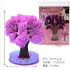 Venta al por mayor transfronteriza de decoraciones navideñas, regalos navideños de floración de nieve, juguetes decorativos pequeños de escritorio