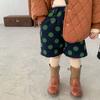 Ropa infantil de Corea del Sur niños nueva ola punto material de lana shorts niños y niñas bebé otoño e invierno lunares lana estilo occidental shorts
