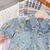 Conjunto Jeans Estilo Coreano para Meninas Verão 2026: Conjunto de Duas Peças: Top Jeans de Manga Curta com Gola Reversível + Shorts Florais